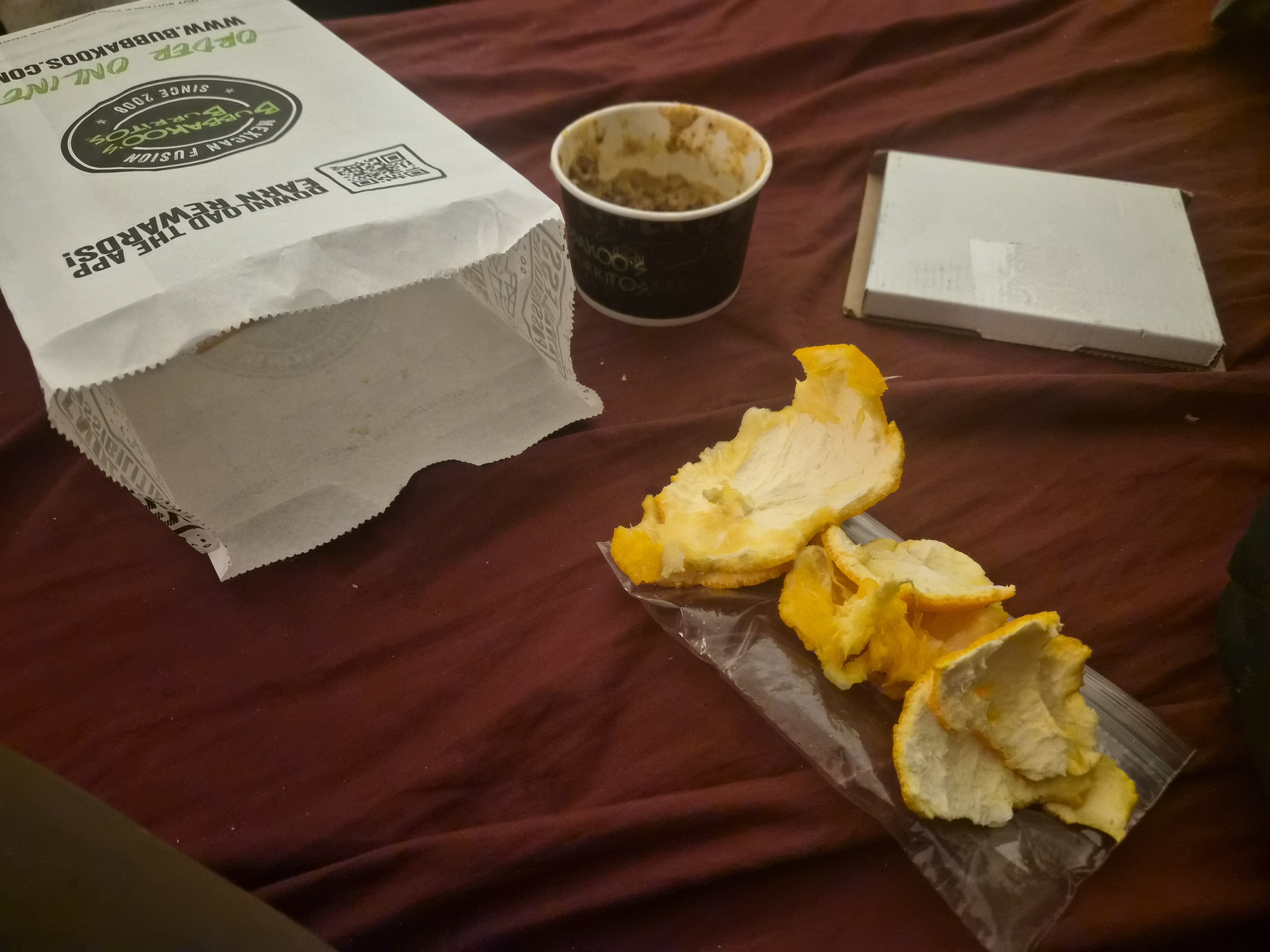 a n orage and a package the size of a cd